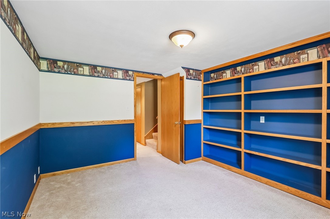 1638 South Cleveland Massillon Road Akron, OH 44321 - Photo 24 of 37 Full wall of built-in bookshelves