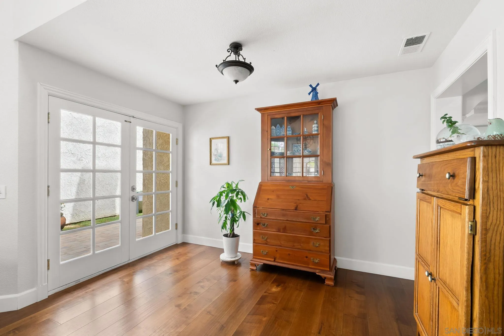 43 Port Royale Road Coronado, CA 92118 - Photo 13 of 42 wooden floor in an empty room with a window