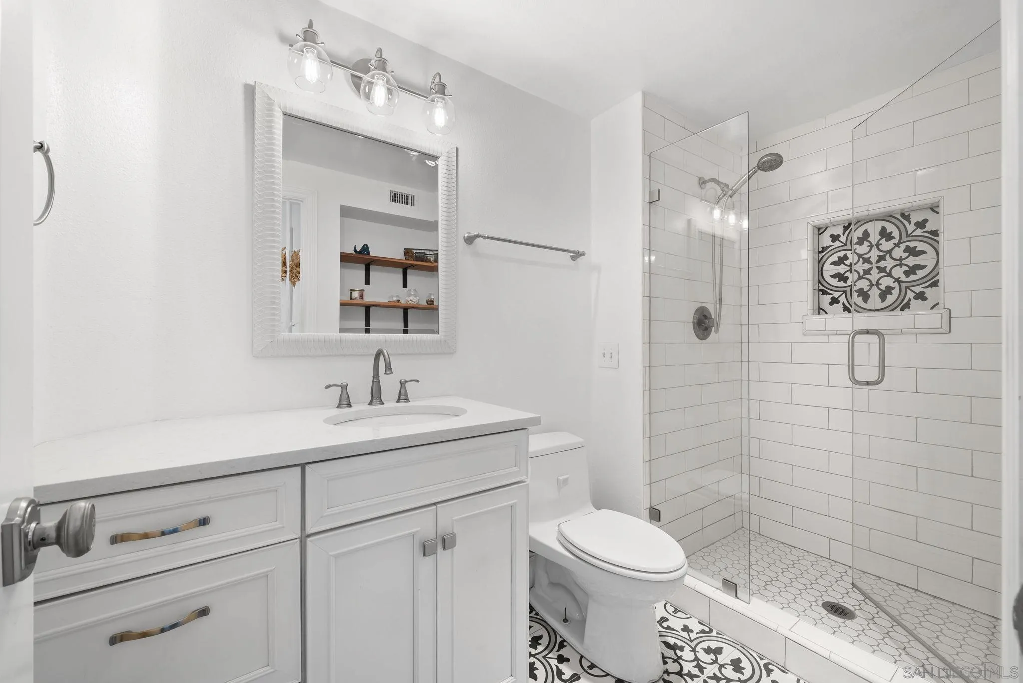 43 Port Royale Road Coronado, CA 92118 - Photo 8 of 42 a bathroom with a sink a toilet and shower