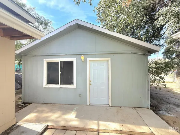 a front view of a house with a garage