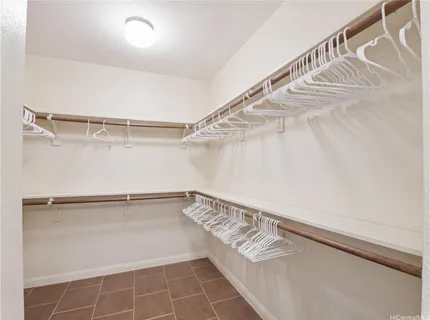 a view of an empty walk in closet