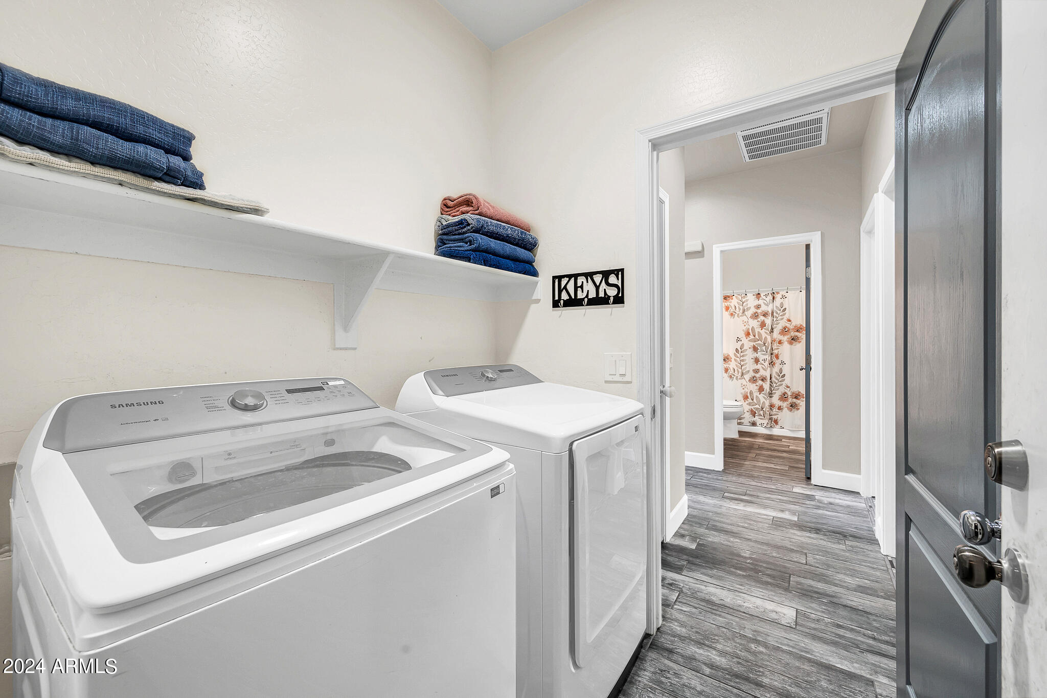 10125 West Payson Road Tolleson, AZ 85353 - Photo 32 of 35 a utility room with dryer and washer