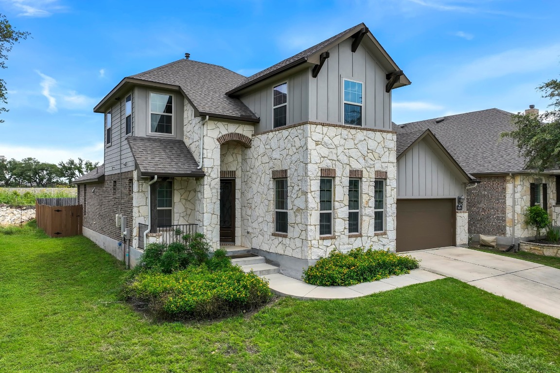505 Fair Oaks Drive Georgetown, TX 78628 - Photo 1 of 1 a front view of a house with garden