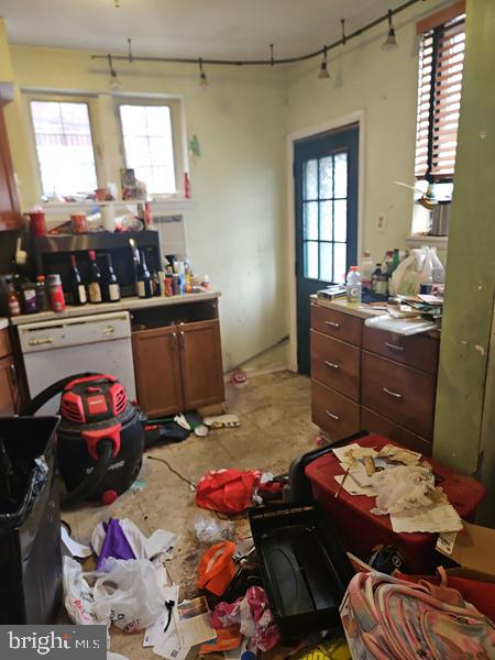 2305 Rhawn Street Philadelphia, PA 19152 - Photo 11 of 19 a room with furniture a window and gym equipment