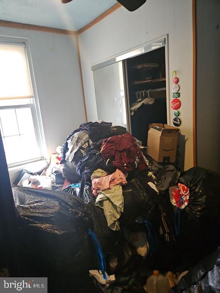 2305 Rhawn Street Philadelphia, PA 19152 - Photo 14 of 19 a bedroom with a bed and a dresser