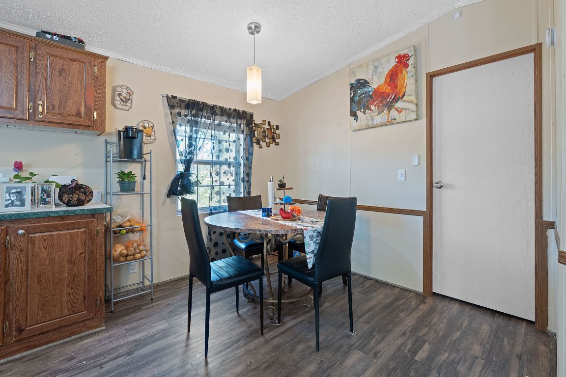 155 Forister Ranch Drive Dale, TX 78616 - Photo 14 of 30 a dining room with furniture and wooden floor