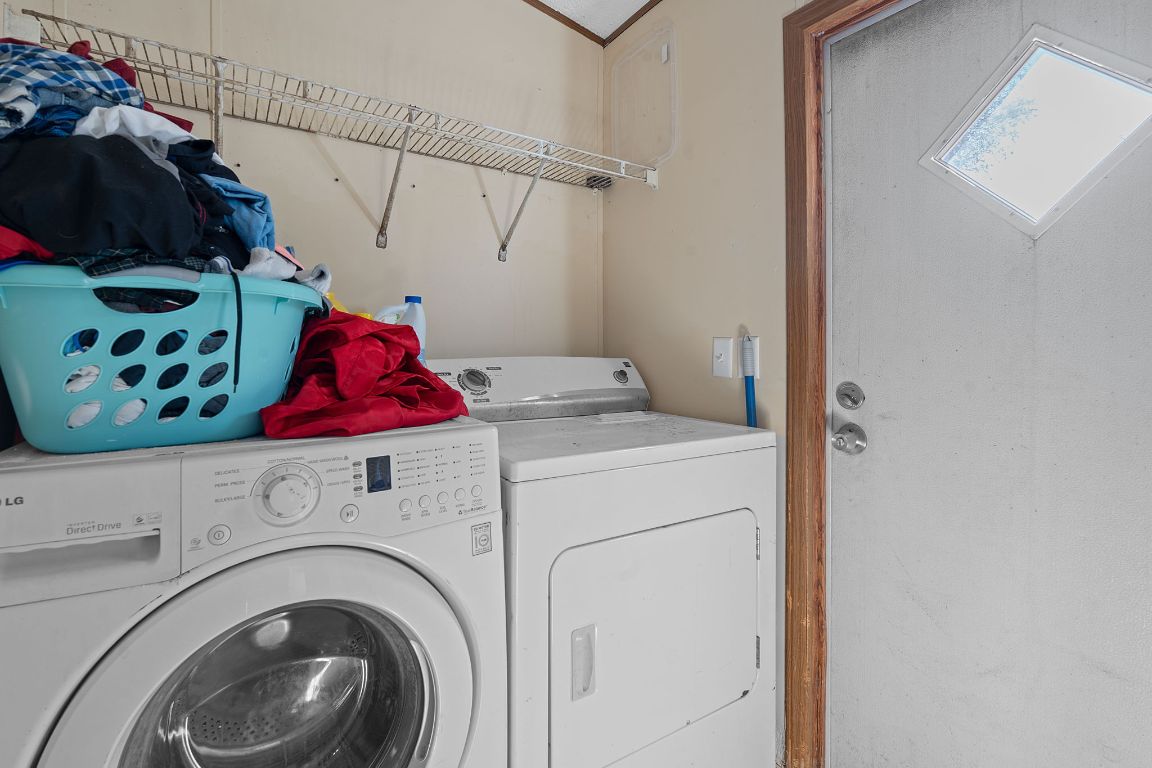155 Forister Ranch Drive Dale, TX 78616 - Photo 24 of 30 a utility room with dryer and washer