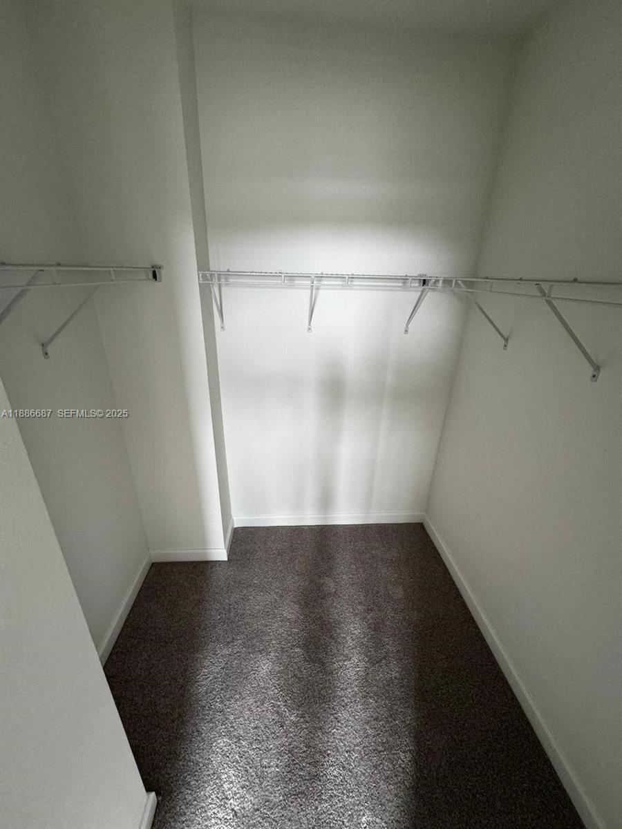 16270 Southwest 292nd Street Homestead, FL 33033 - Photo 14 of 29 a view of a room with wooden floor