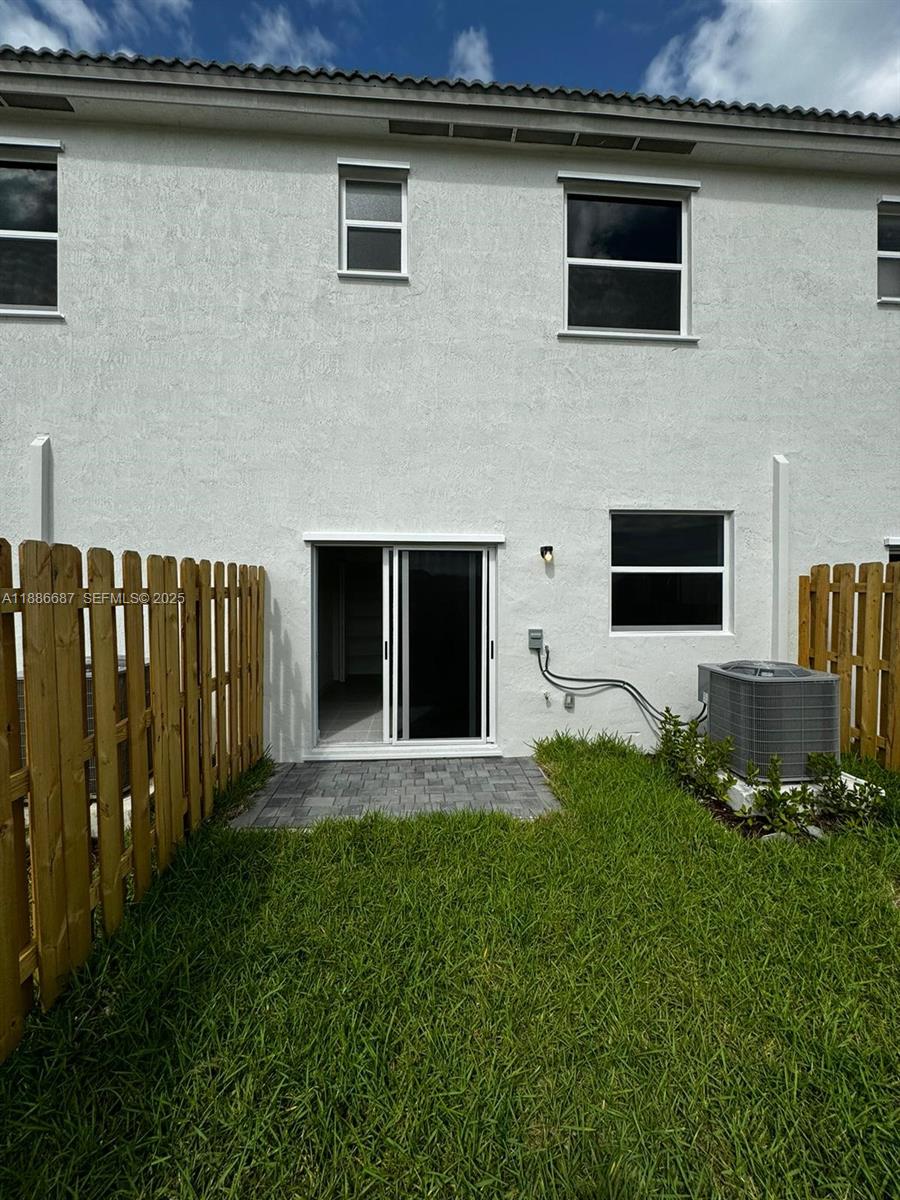 16270 Southwest 292nd Street Homestead, FL 33033 - Photo 29 of 29 a front view of a house with yard