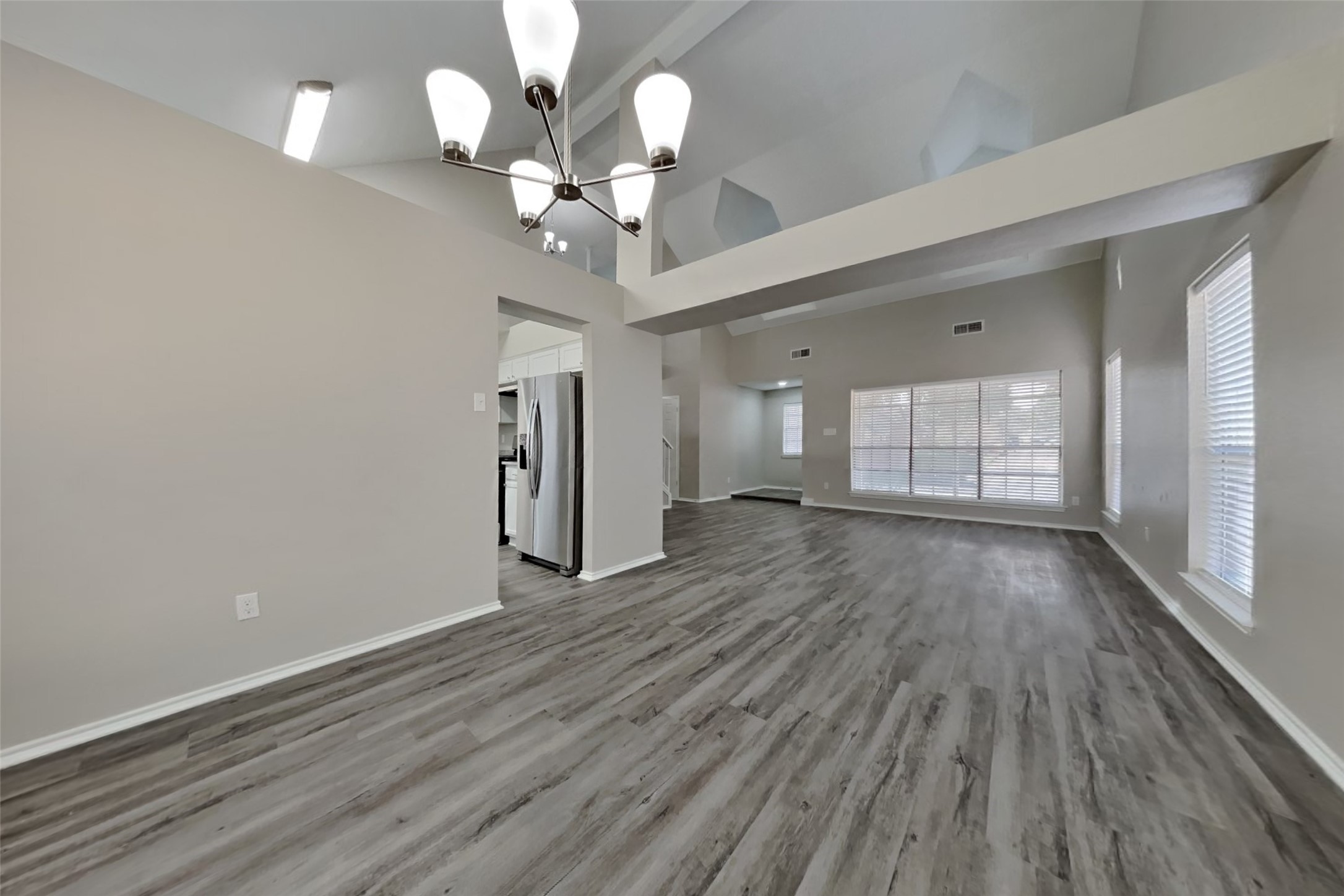 17030 Highworth Drive Spring, TX 77379 - Photo 12 of 24 a view of an empty room and wooden floor