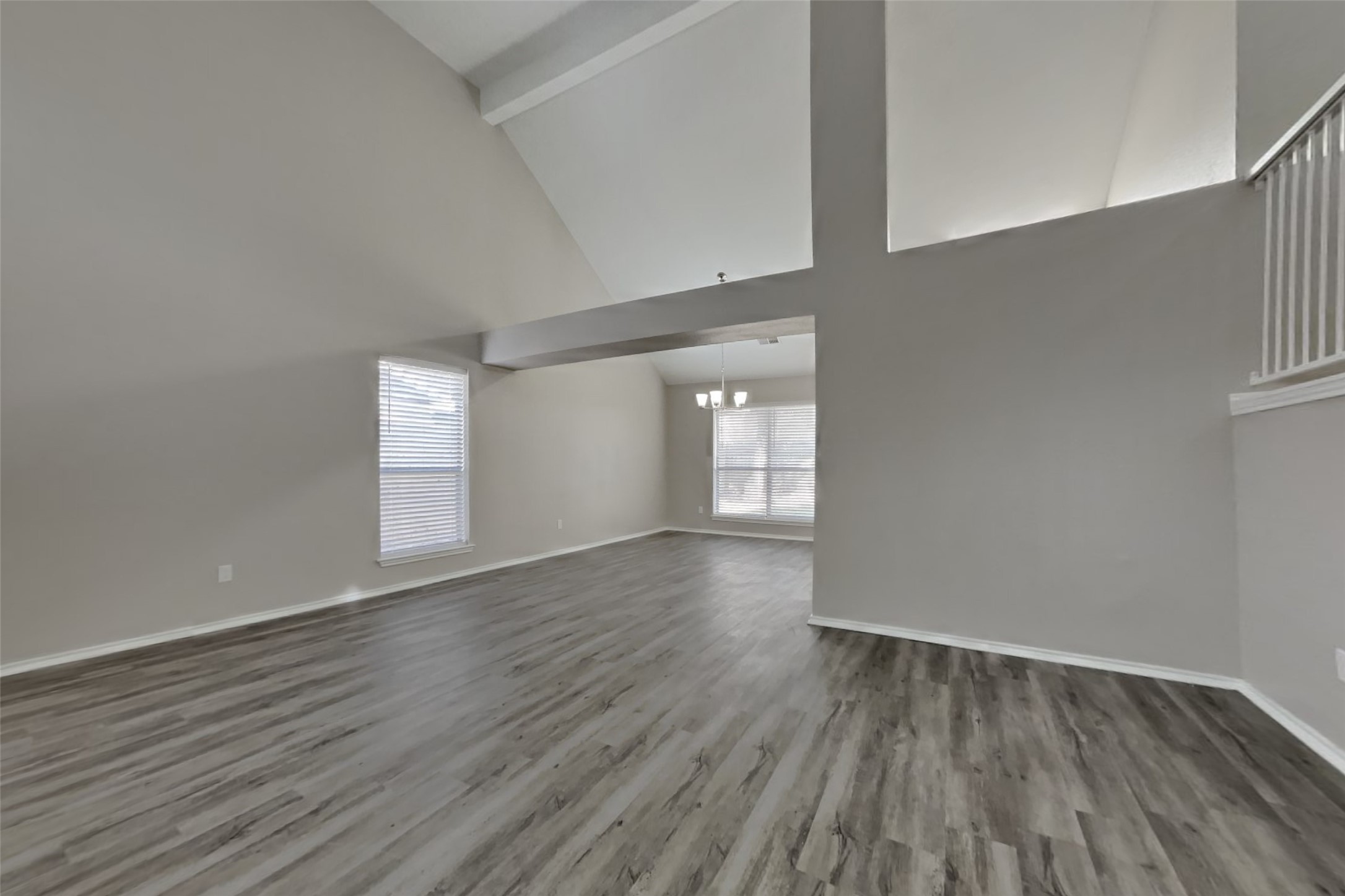 17030 Highworth Drive Spring, TX 77379 - Photo 5 of 24 a view of an empty room with wooden floor and window