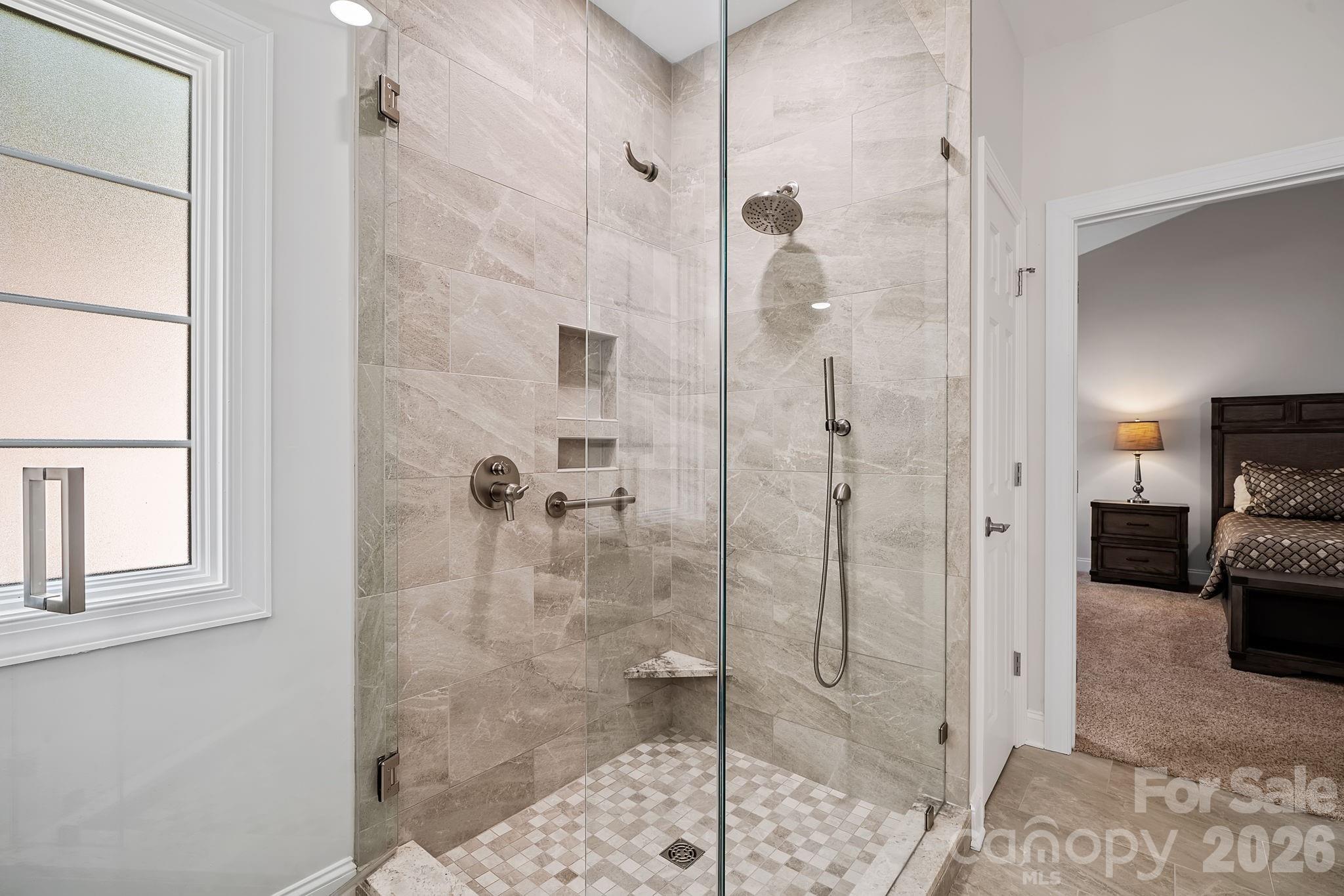 455 Blue Mist Way Arden, NC 28704 - Photo 22 of 46 a bathroom with a shower and a sink