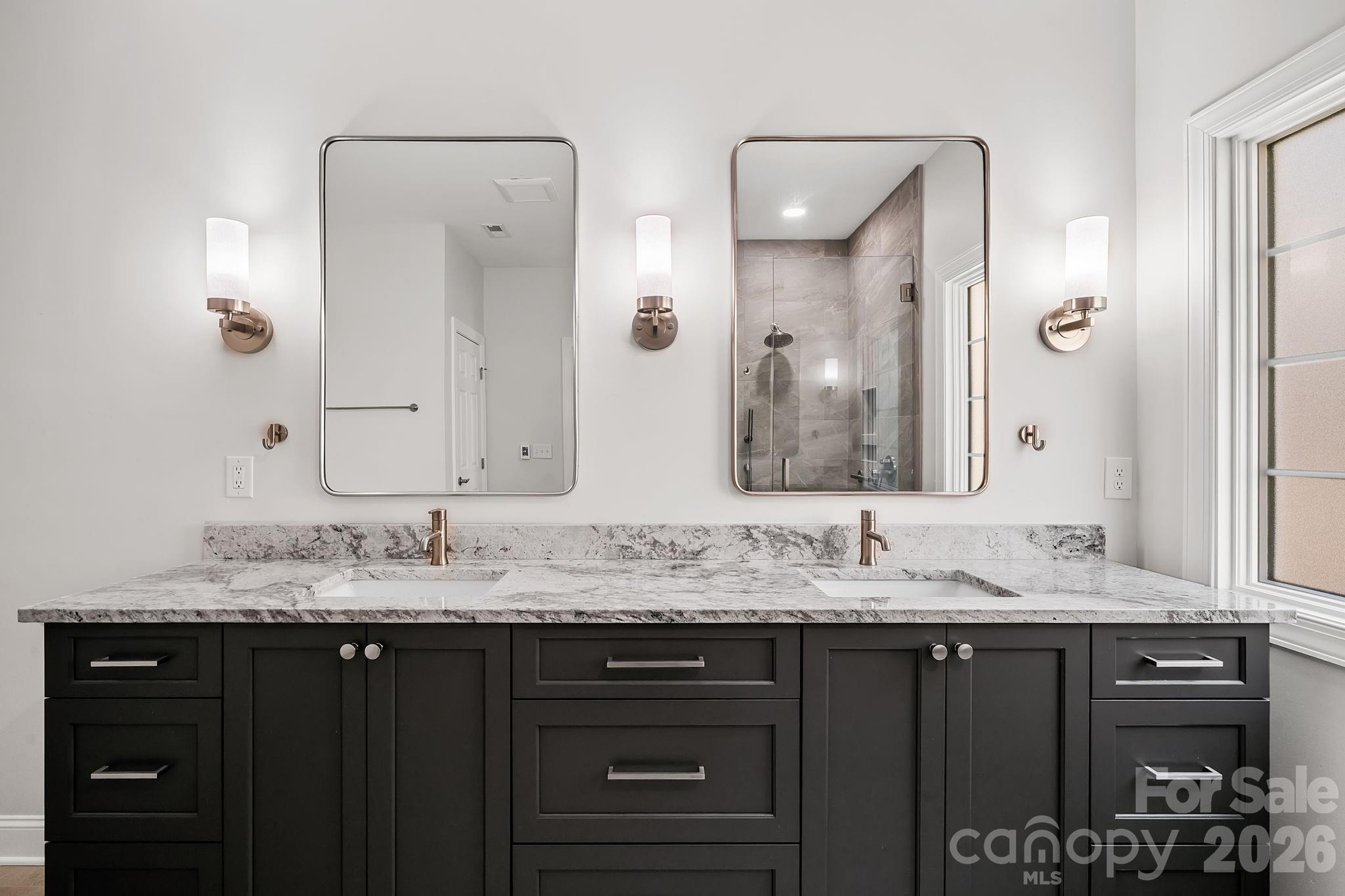 455 Blue Mist Way Arden, NC 28704 - Photo 24 of 46 a bathroom with a granite countertop double vanity sink and a mirror