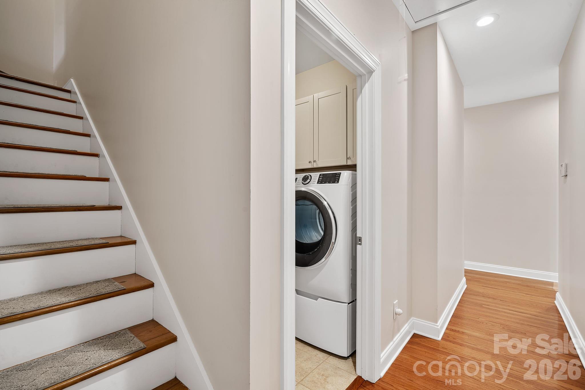 455 Blue Mist Way Arden, NC 28704 - Photo 32 of 46 a view of a hallway with washer and dryer