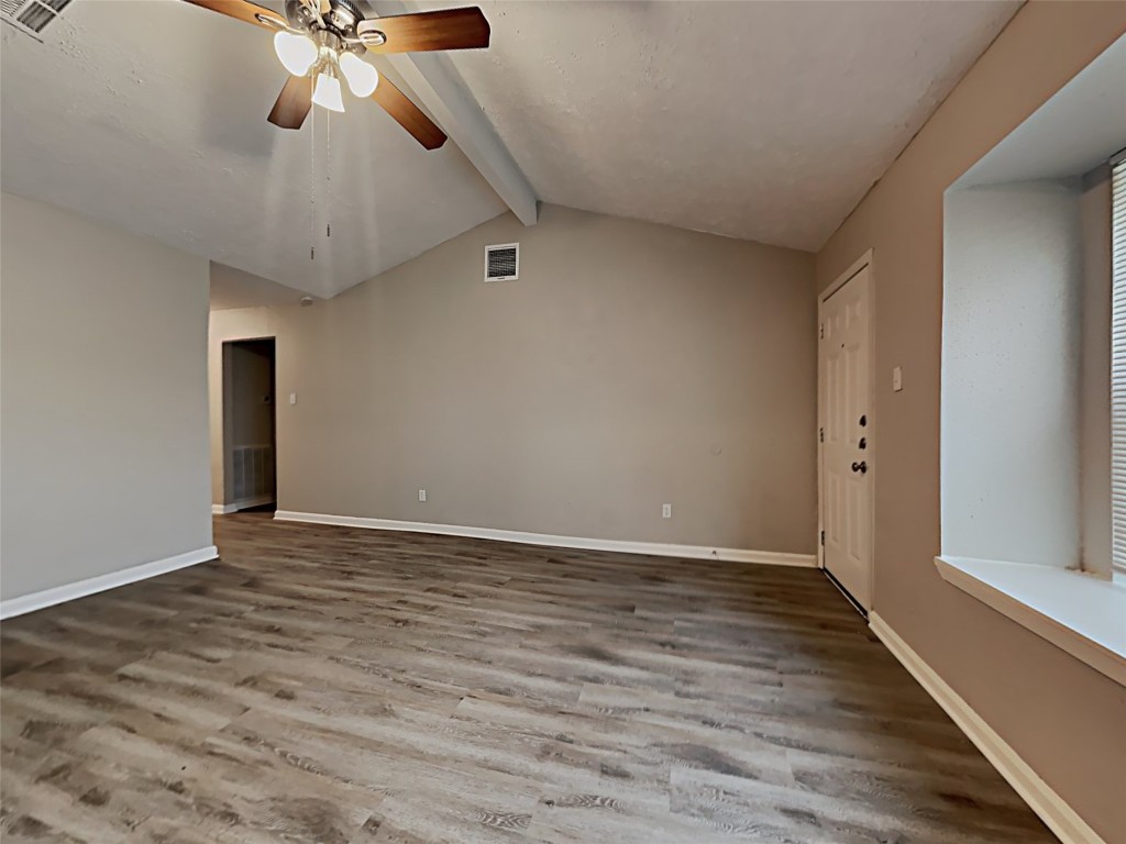 15914 Ridgeroe Lane Houston, TX 77053 - Photo 2 of 18 a view of an empty room with wooden floor
