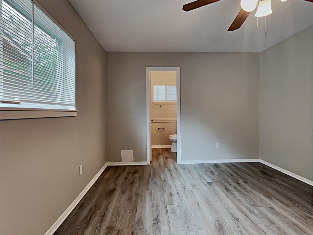 15914 Ridgeroe Lane Houston, TX 77053 - Photo 9 of 18 a view of a room with wooden floor and a window