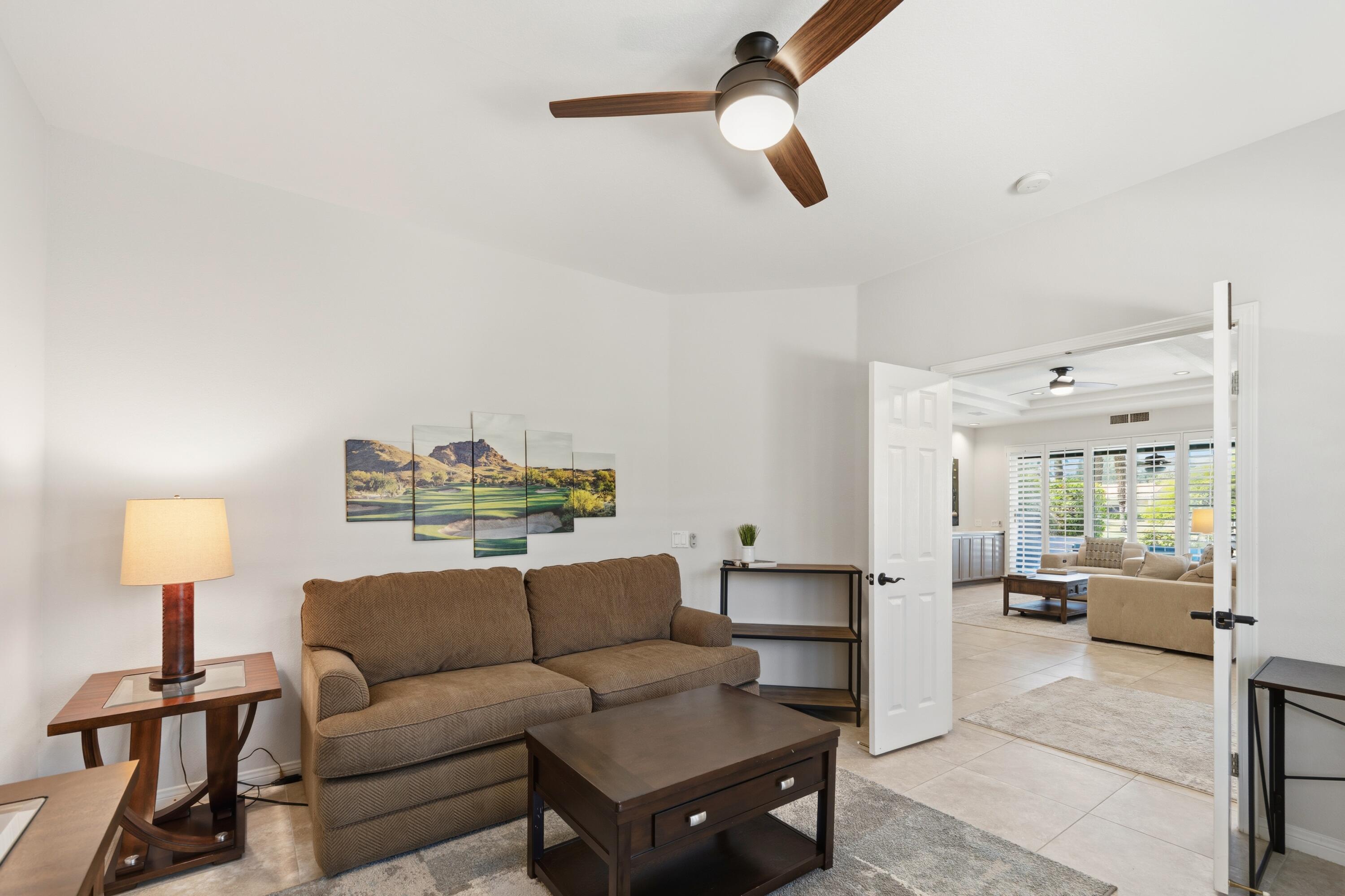 39 Augusta Drive Rancho Mirage, CA 92270 - Photo 23 of 53 a living room with furniture and a window