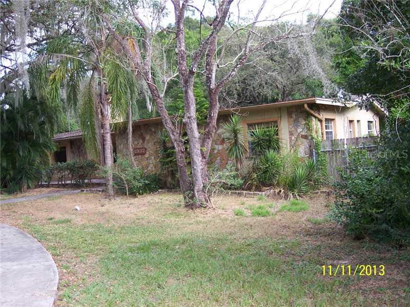 1932 Providence Road Brandon, FL 33511 - Photo 1 of 1 a view of a house with a tree in the yard