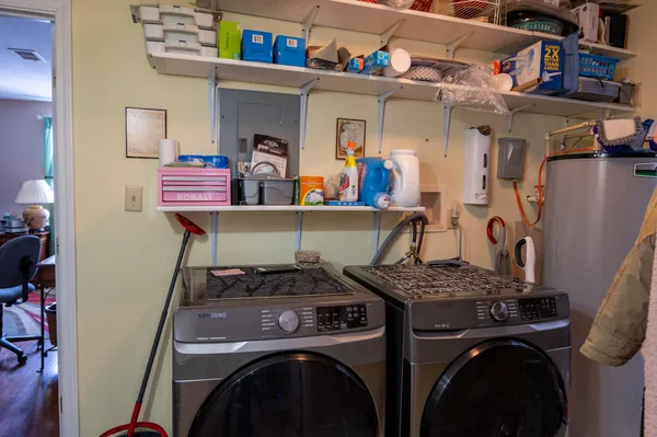 a utility room with dryer and washer