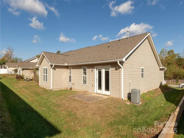 a house view with a backyard space