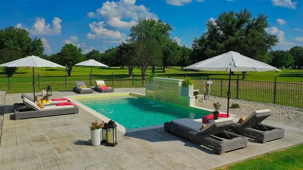 a garden view with a seating space
