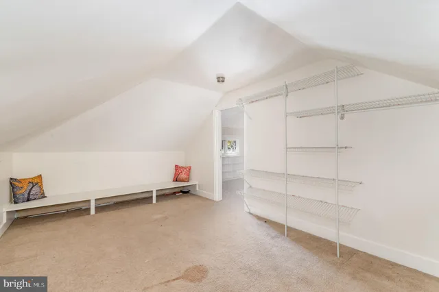 a view of an empty room with empty racks