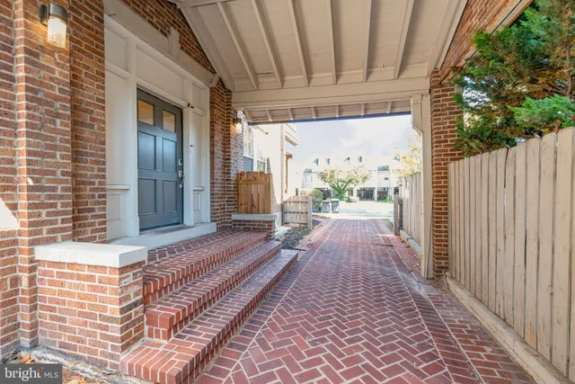 a view of a pathway with a balcony