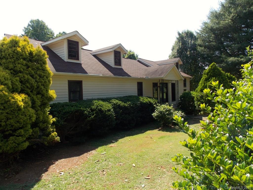 1882 New Cut Church Road Lancaster, SC 29720 - Photo 1 of 21 a front view of a house with a garden