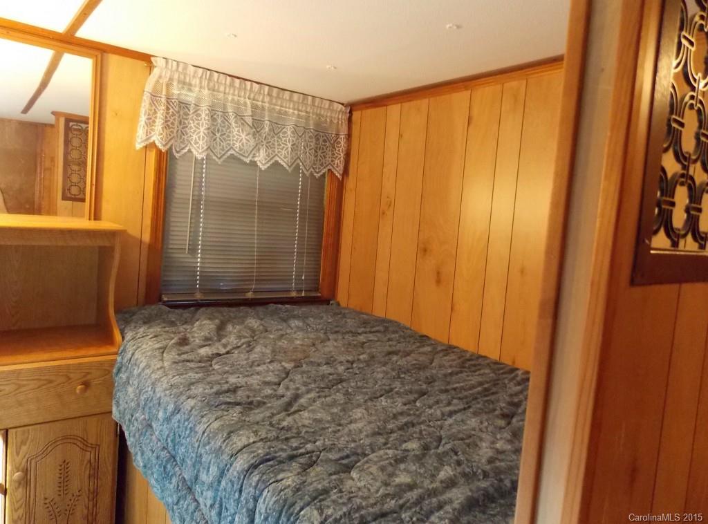 1882 New Cut Church Road Lancaster, SC 29720 - Photo 17 of 21 a bedroom with a bed and a window
