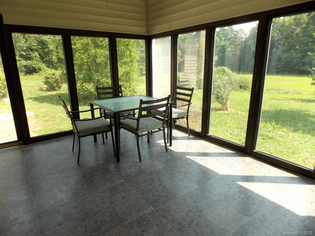 1882 New Cut Church Road Lancaster, SC 29720 - Photo 6 of 21 a dining room with furniture and a floor to ceiling window