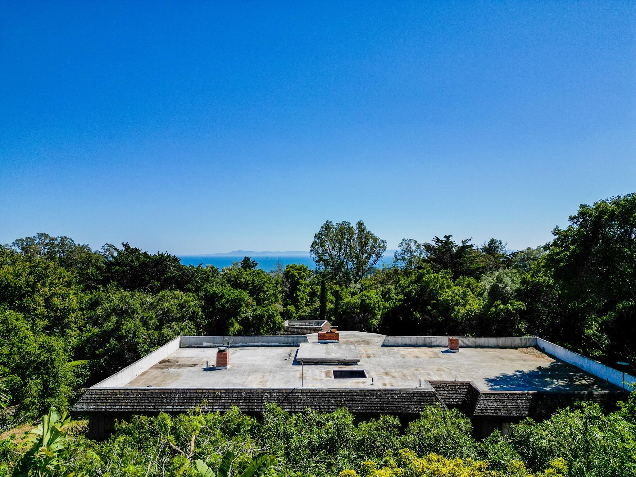 756 Hot Springs Road Montecito, CA 93108 - Photo 12 of 32 a view of a house with a yard and sitting area