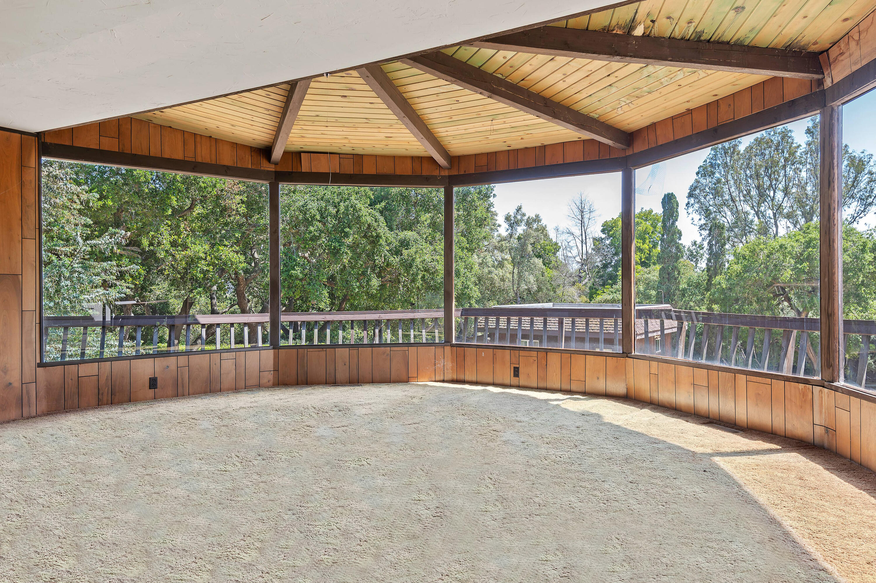 756 Hot Springs Road Montecito, CA 93108 - Photo 14 of 32 a view of an empty room with a balcony and swimming pool