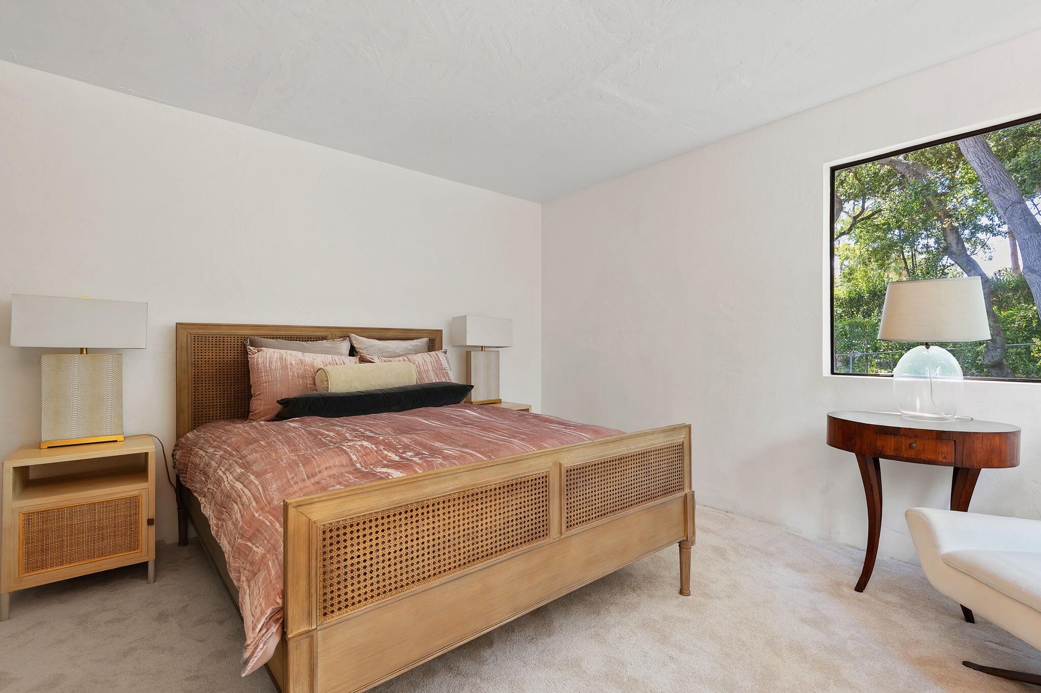 756 Hot Springs Road Montecito, CA 93108 - Photo 19 of 32 a bedroom with a bed and window