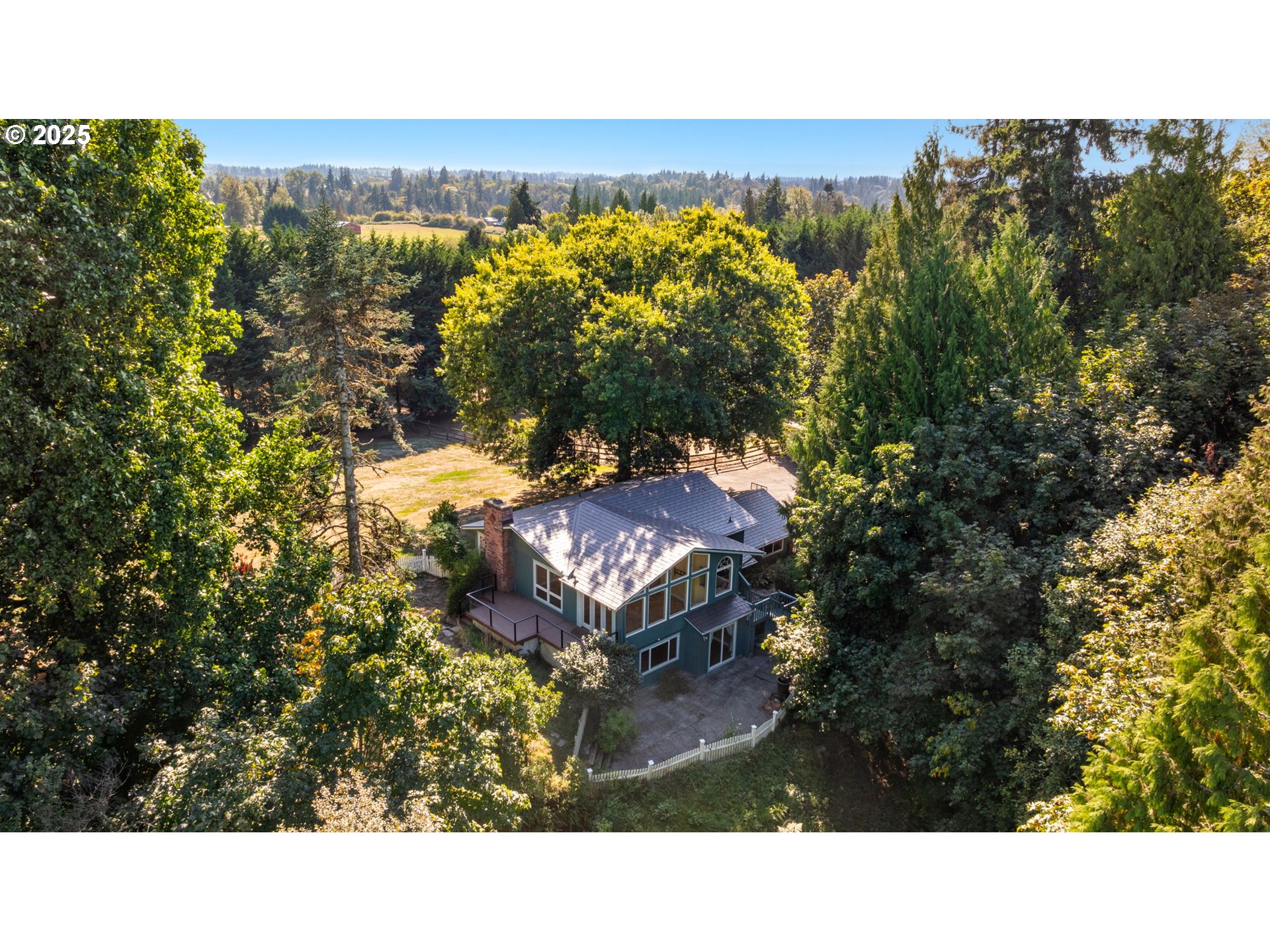901 Northwest 319th Street Ridgefield, WA 98642 - Photo 4 of 38 a balcony with a view of a city