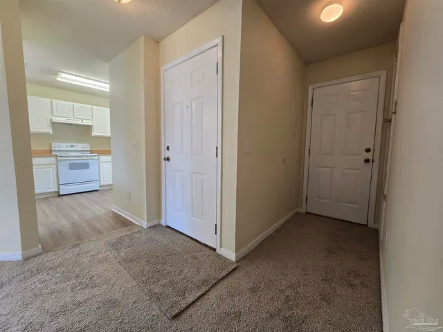 a view of a room with a wardrobe space