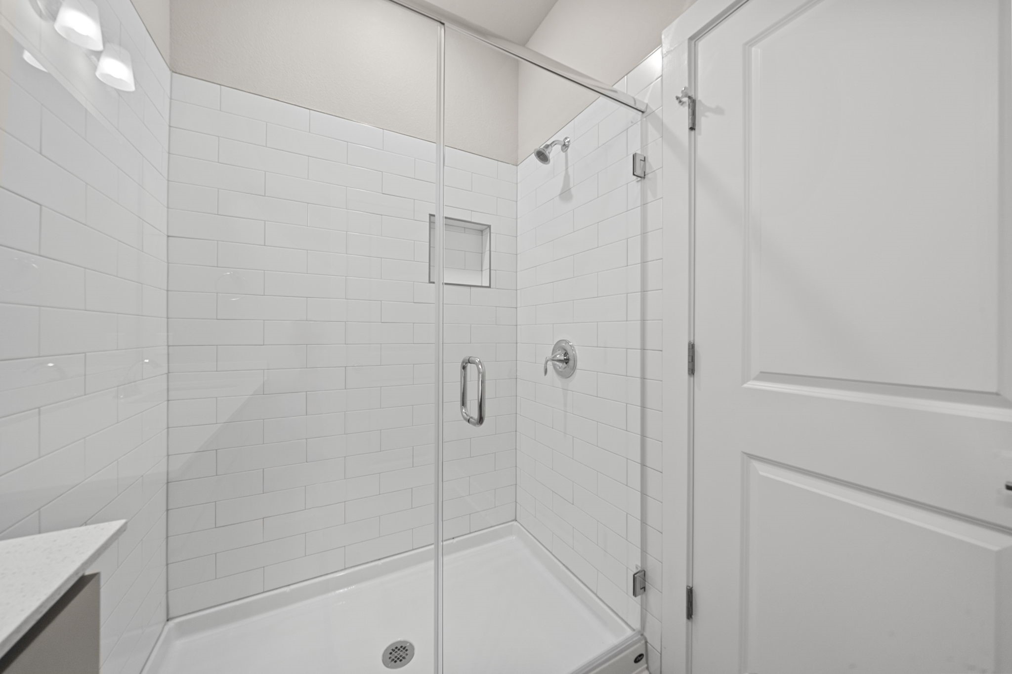 219 Pinnacle Lane Kyle, TX 78640 - Photo 12 of 20 a bathroom with a shower