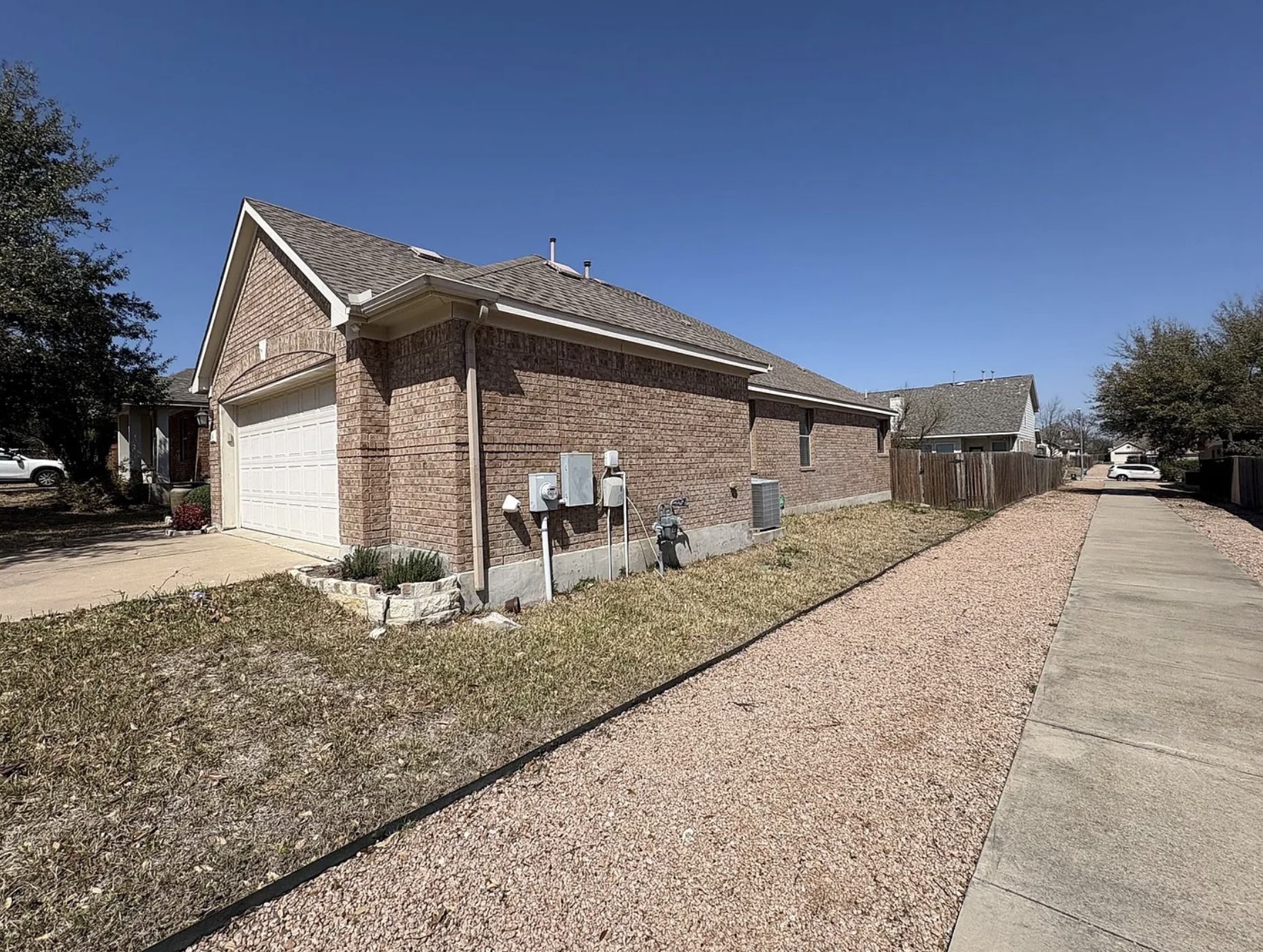 2316 Dovetail Street Pflugerville, TX 78660 - Photo 2 of 2 a front view of a house with a yard