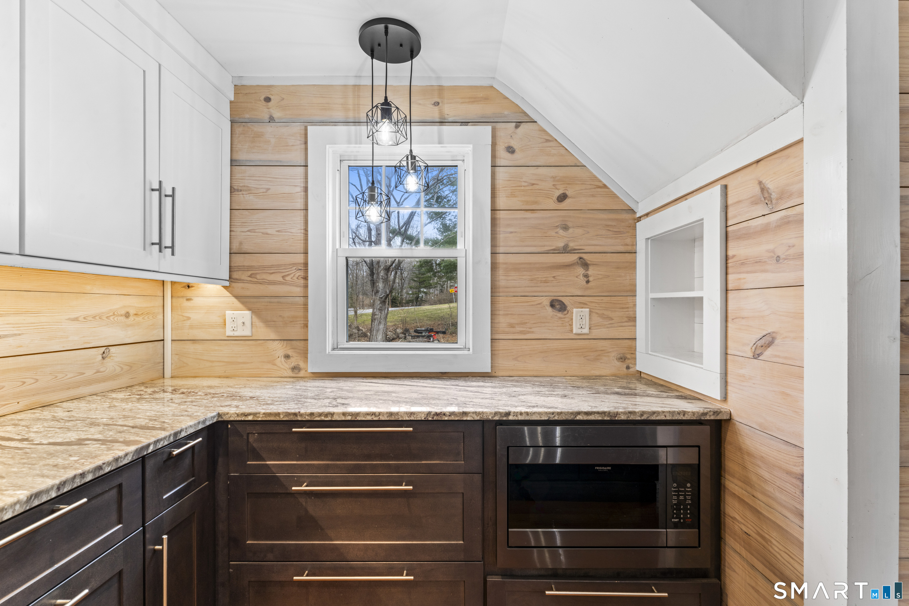 74 Middle Quarter Road Woodbury, CT 06798 - Photo 19 of 40 a kitchen with a sink and a stove