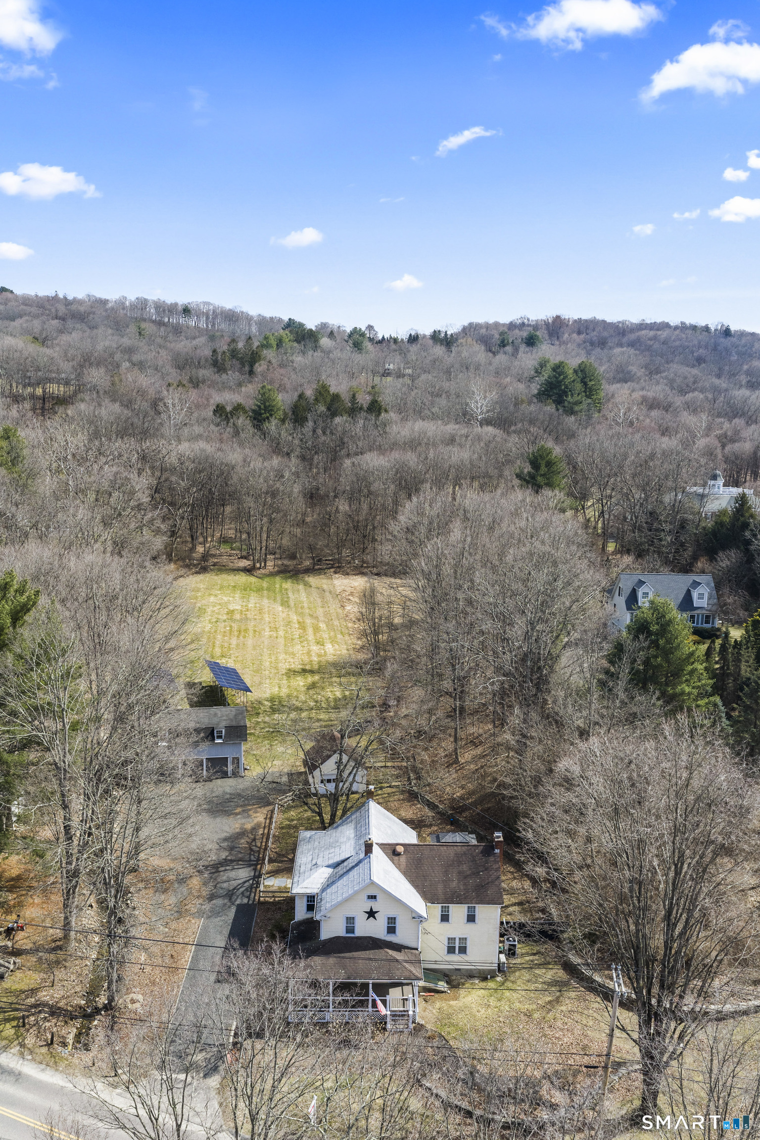 74 Middle Quarter Road Woodbury, CT 06798 - Photo 2 of 40 a view of a terrace with a lake view