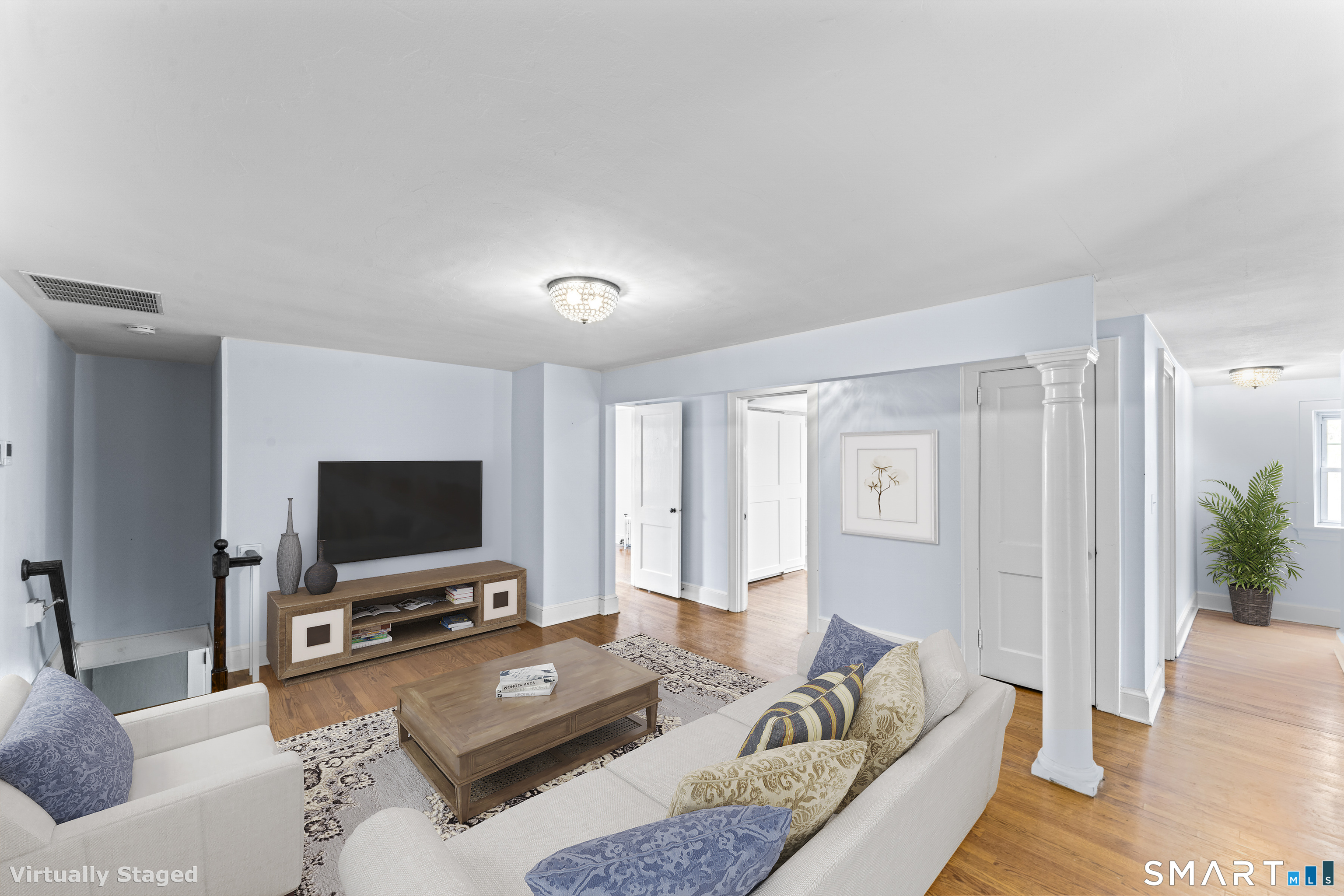 74 Middle Quarter Road Woodbury, CT 06798 - Photo 22 of 40 a living room with furniture and a flat screen tv