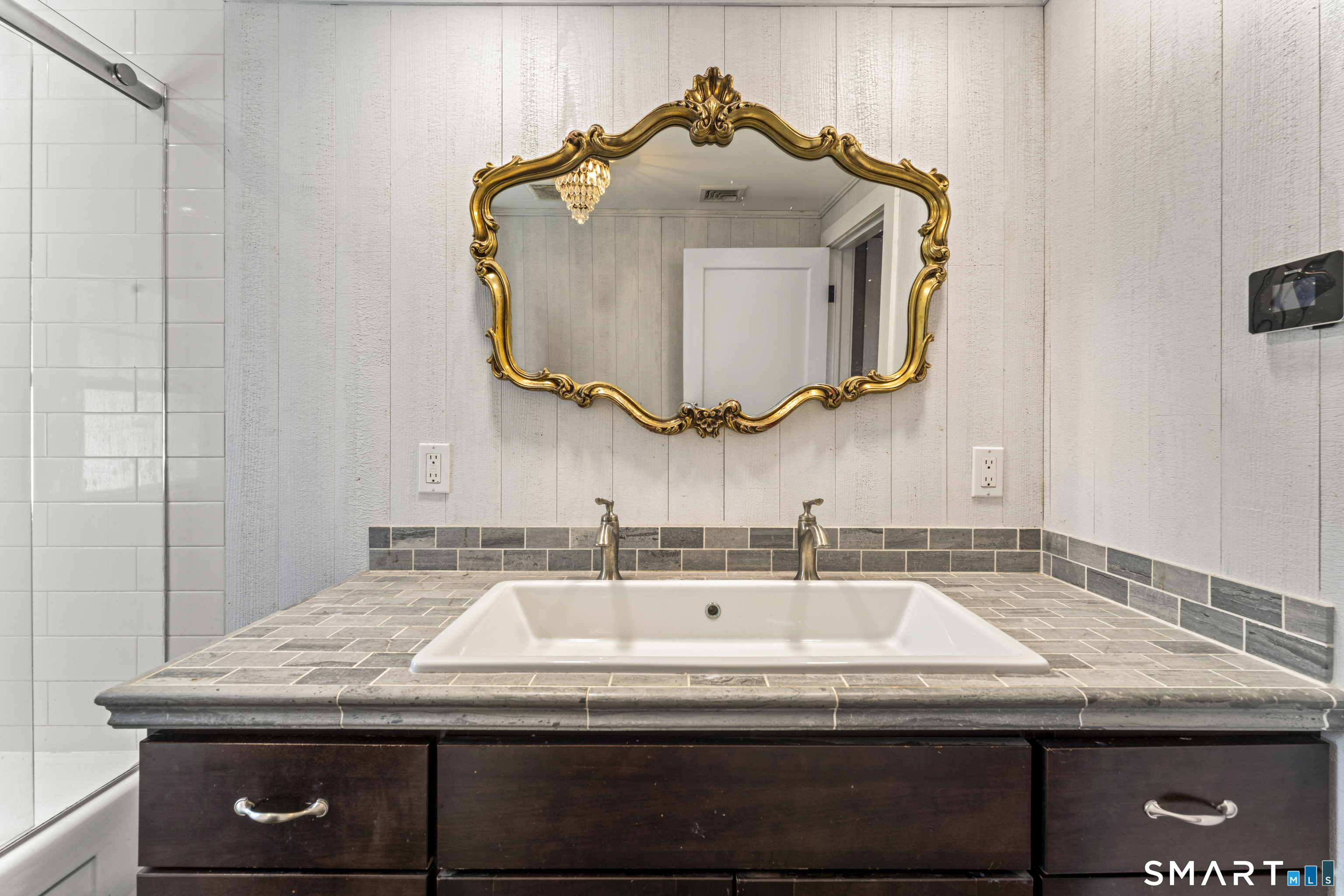 74 Middle Quarter Road Woodbury, CT 06798 - Photo 23 of 40 a bathroom with a granite countertop sink and a mirror