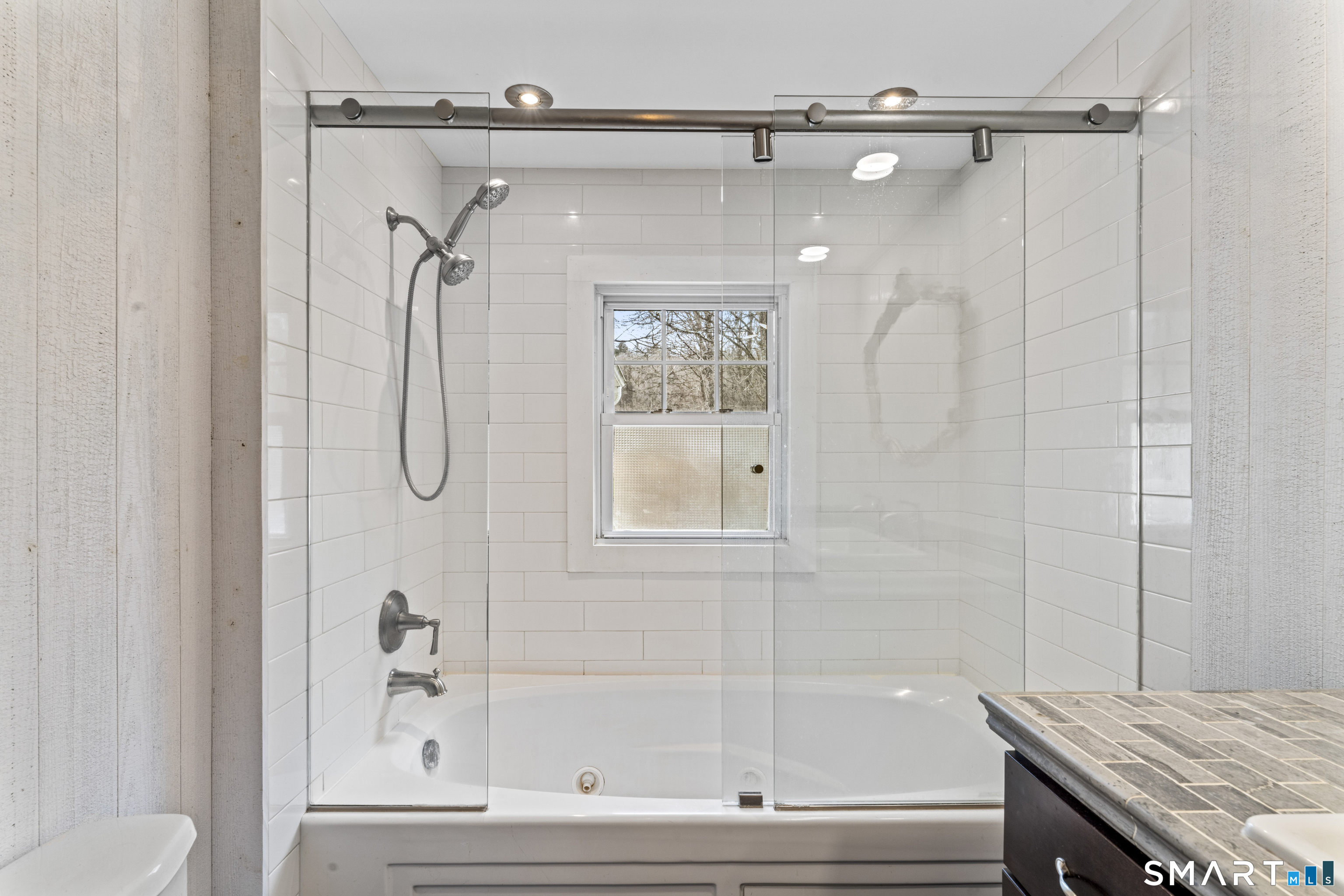 74 Middle Quarter Road Woodbury, CT 06798 - Photo 24 of 40 a bathroom with a granite countertop shower and a sink