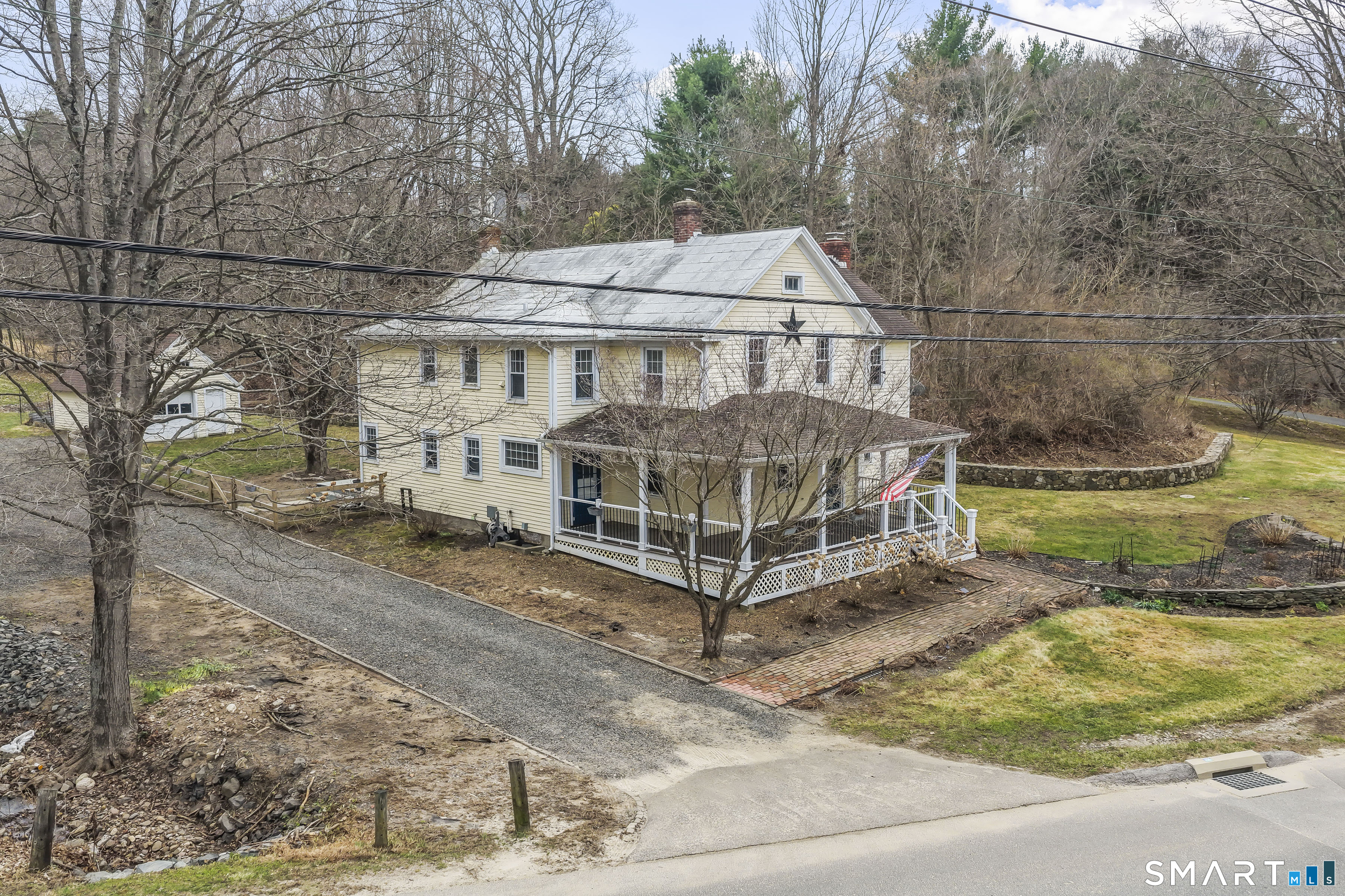 74 Middle Quarter Road Woodbury, CT 06798 - Photo 38 of 40 a view of a house with a yard