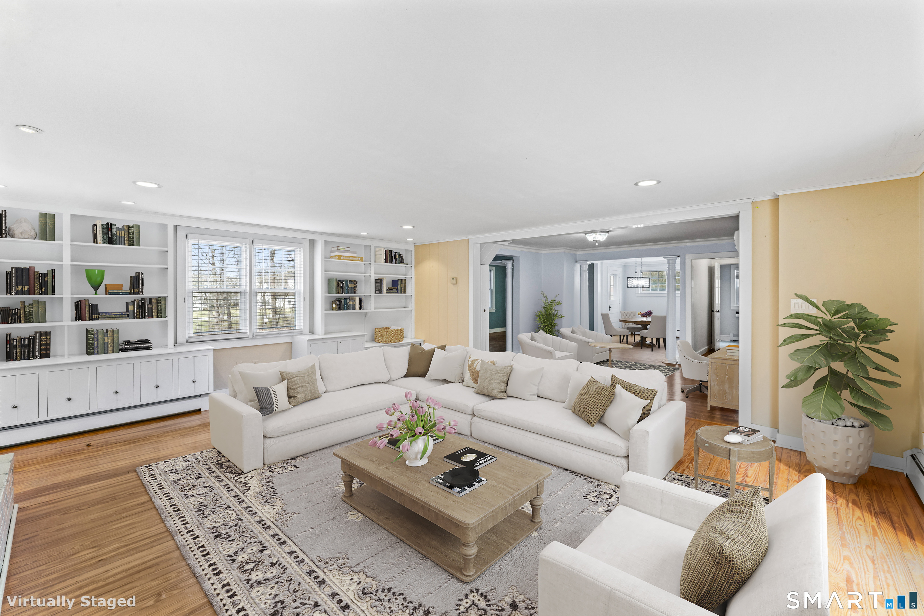 74 Middle Quarter Road Woodbury, CT 06798 - Photo 10 of 40 a living room with furniture and a large window