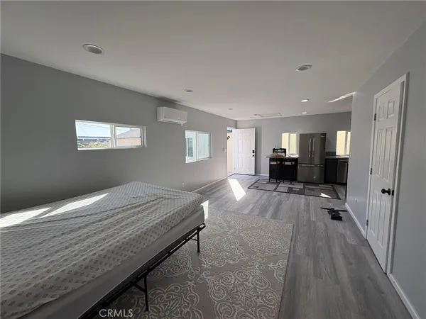 a bed room with a bed furniture and a window