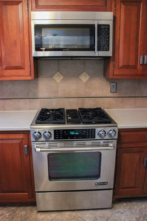 173 West Ingomar Road Pittsburgh, PA 15237 - Photo 13 of 20 JennAir microwave and gas cook top with convection oven.