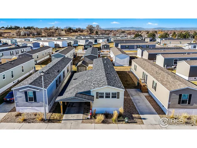 an aerial view of a house with a garden