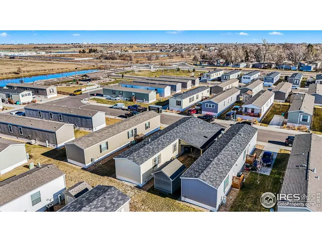 an aerial view of a building with beach