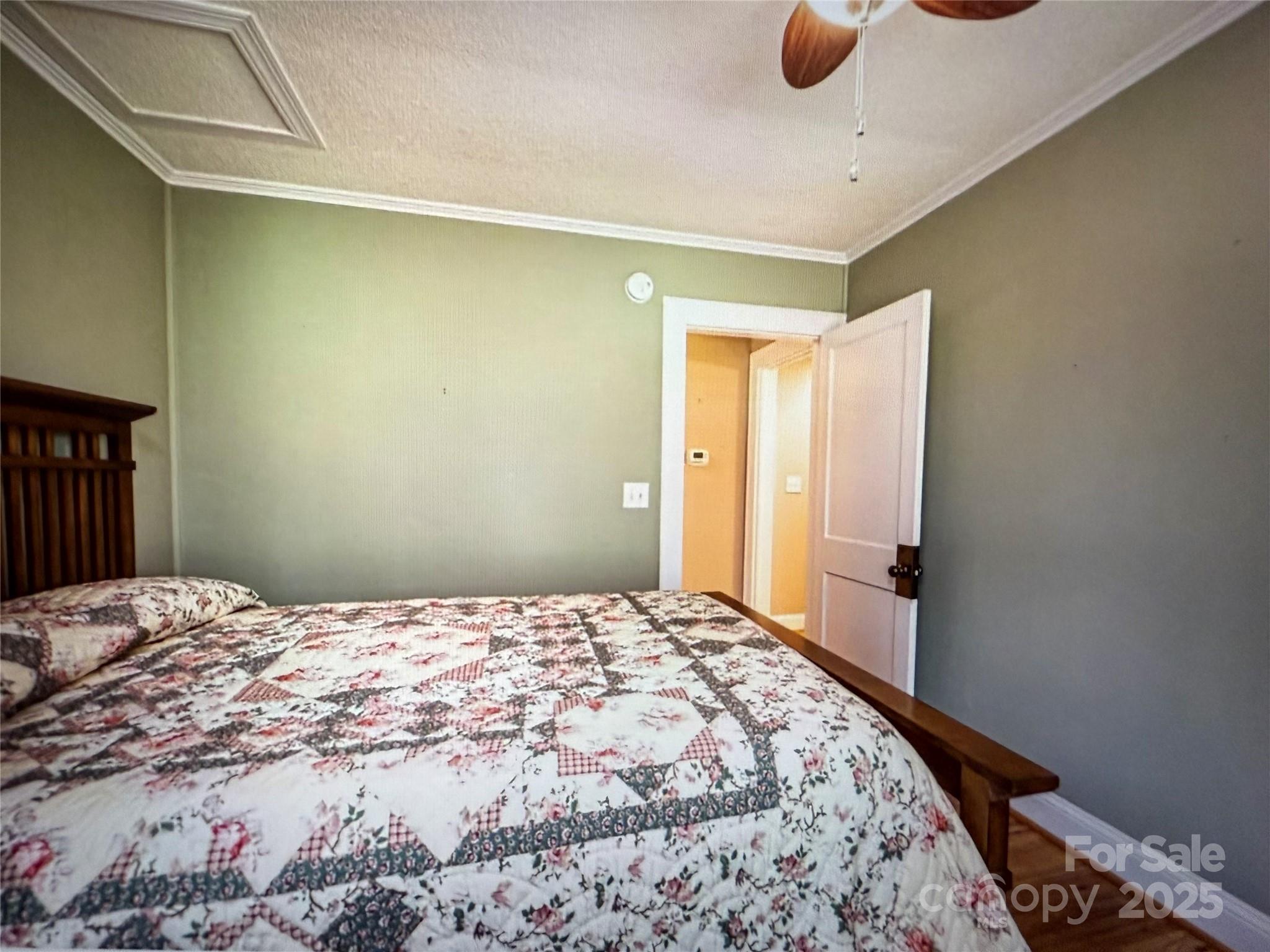 1170 Gold Knob Road Salisbury, NC 28146 - Photo 23 of 34 a bedroom with a bed and painting on the wall