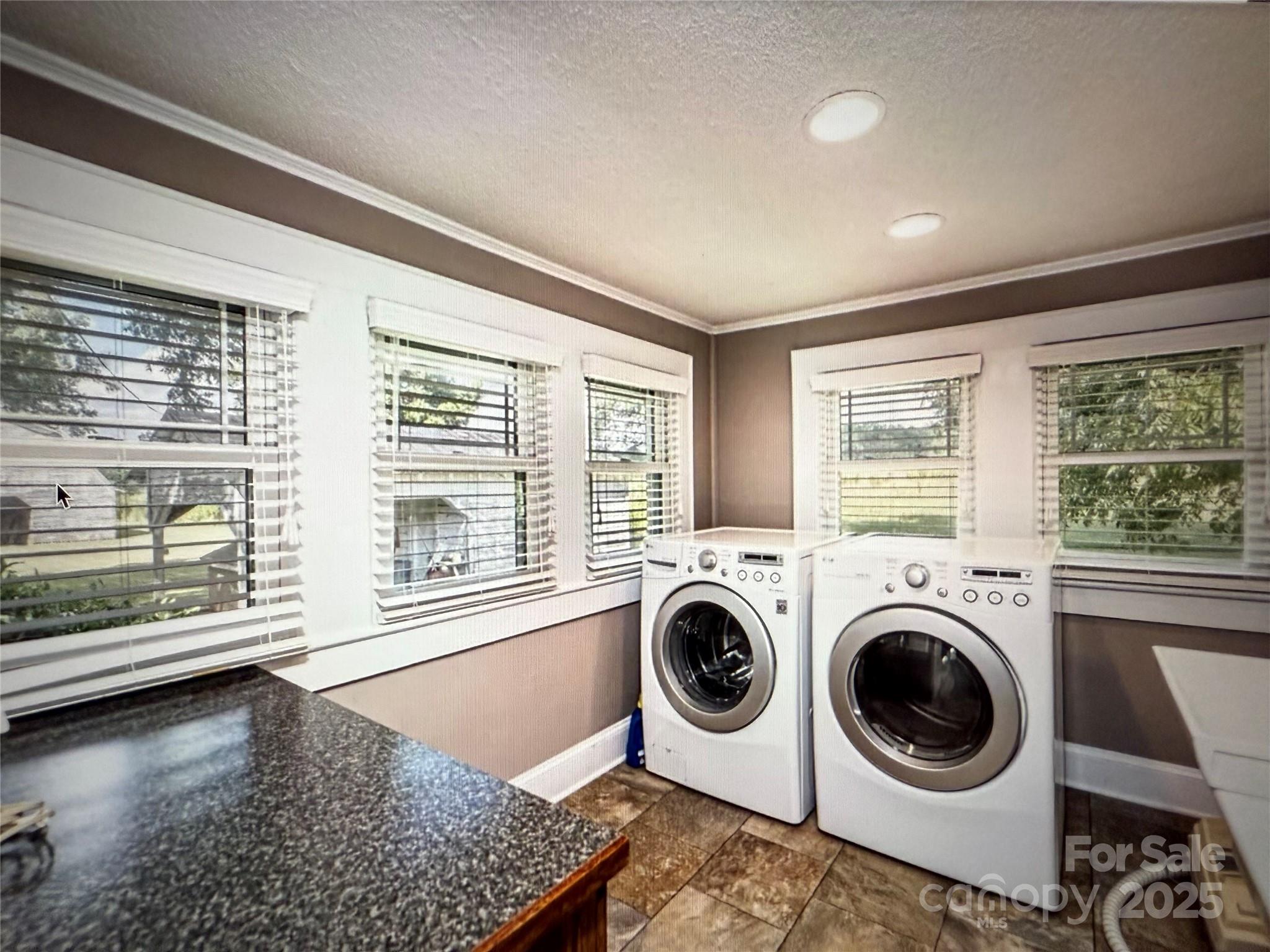 1170 Gold Knob Road Salisbury, NC 28146 - Photo 27 of 34 a view of a bedroom with washer and dryer